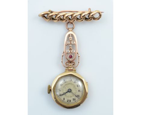 A 9ct yellow gold lady's watch, now set on Art Nouveau style bracket with rope twist brooch bar, as a nurse's watch.