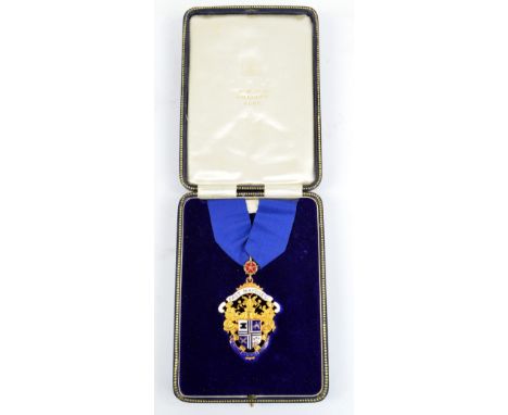 A 9ct yellow gold and enamel 'Past Mayoress' jewel bearing the Bury town crest and motto with red Lancashire Rose suspension 