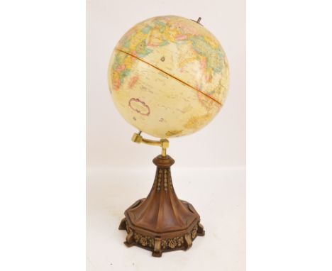 A vintage Reploge 12" diameter 'World Classic' series globe on shaped spreading floral decorated base, height 59.5cm.