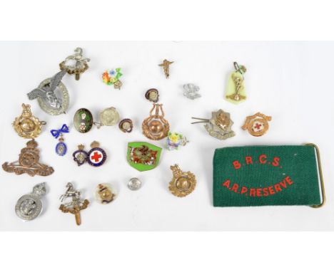 A quantity of military and other badges and buttons including a Cheshire Constabulary cap badge, a Royal Corps of Signals swe