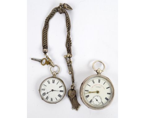 A silver pocket watch with circular white enamel dial set with Roman numerals inscribed 'The Express English Lever, J. G. Gra