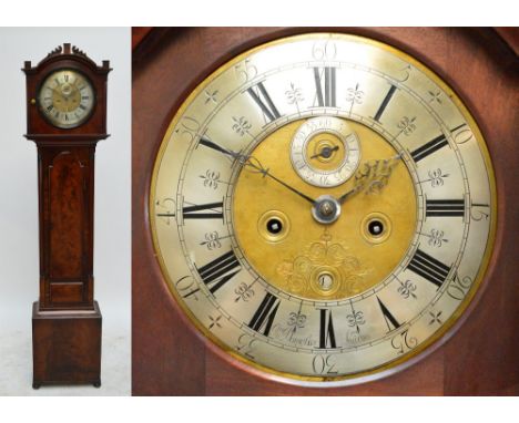 A Regency mahogany longcase clock, the shaped hood with circular dial set with silvered chapter ring, subsidiary seconds hand