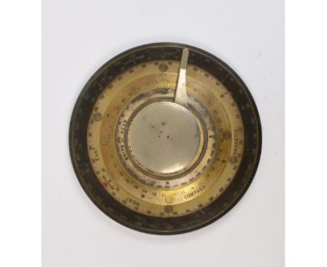 An early 19th century ship's brass and nickel plated weighted circular compass, with fixed outer wheel and three moving inner
