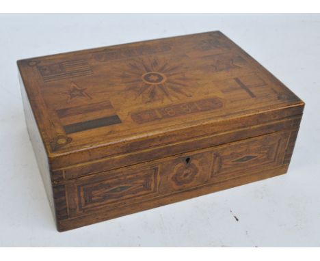A late 19th century walnut and inlaid work box, the top with flag and compass decoration, inscribed 'A Gift 1881', enclosing 
