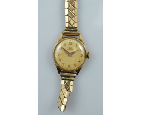 OMEGA; a lady's vintage 9ct gold cased wristwatch, the circular dial set with Arabic numerals (strap af).