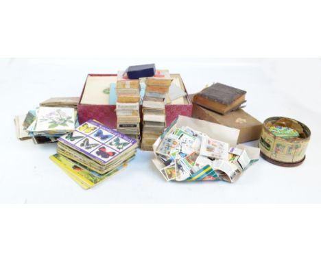 A large quantity of cigarette cards, loose in sets and part sets and in albums, including Gallaher, Wills, Players, etc, also