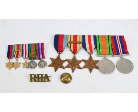 A WWII medal group for the Royal Household Artillery consisting War Medal, defence Medal, France and Germany Star, Africa Sta