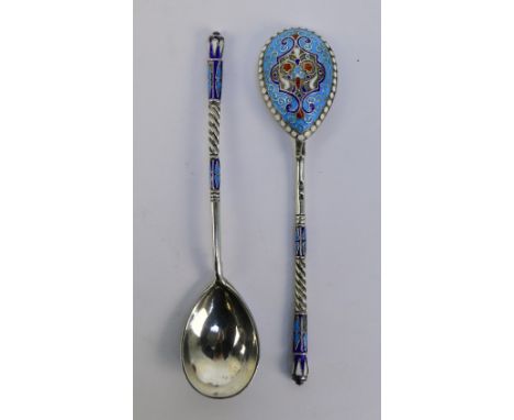 IVAN ZAKHAROV; A pair if 19th century Russian silver and champlevé enamelled spoons, Moscow 1856-1896, length 13.5cm.   CONDI