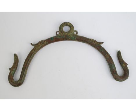 A bronze situla handle, c.30th dynasty, c.30 A.D., last of Ptolemaic period, width 30cm. Note: purchased by the vendor direct