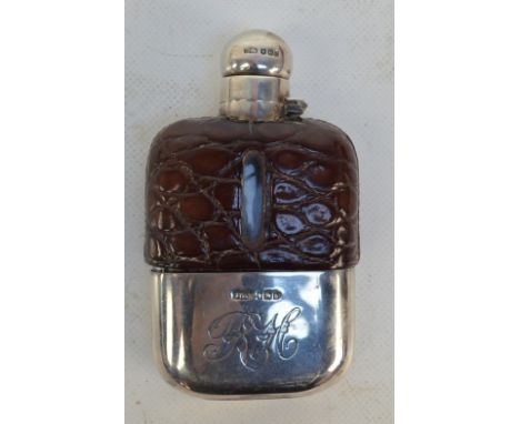 JAMES DIXON & SONS; a late Victorian glass, 'mock croc' leather and hallmarked silver hip flask with removable cup, initialle