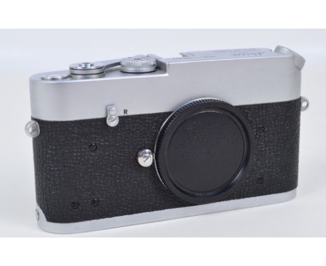 LEICA; a MDa-1265932 camera, body only, in working condition.   CONDITION REPORT:  Overall in good condition, minor surface w