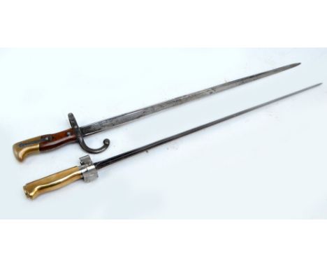 A 19th century French infantry sword bayonet for Rifle Gras, inscribed 'Mre d'Armes de Tulle Octobre 1877' to the blade, leng