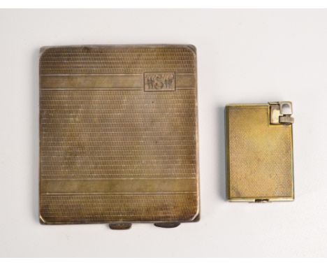 HARMAN BROS; a George V hallmarked silver cigarette case of rectangular form with overall engine turned decoration, with rect