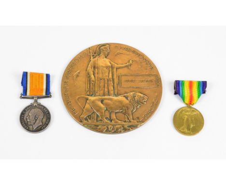 Two WWI medals with ribbons, inscribed to '24510 PTE. H. LEDGER. NORTH. N. R.' and a bronze memorial plaque (3).