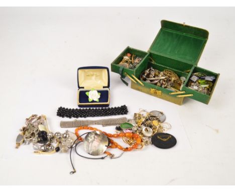 A quantity of vintage and other costume jewellery to include a Victorian white metal engraved brooch, three oval stone mounte