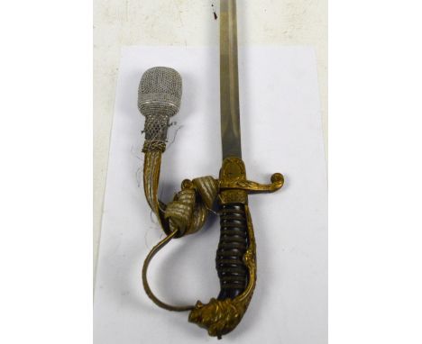 A WWII period German Third Reich officer's dress sword, the lion pommel above wire work grip, slightly curved blade and metal