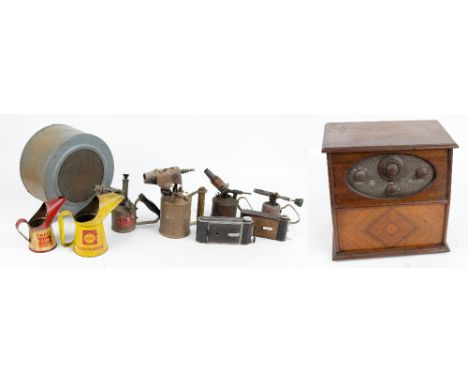 A mixed collectors' lot including two Shell oil cans, a quantity of small blow lamps, a Pontiac folding bellows camera, and a