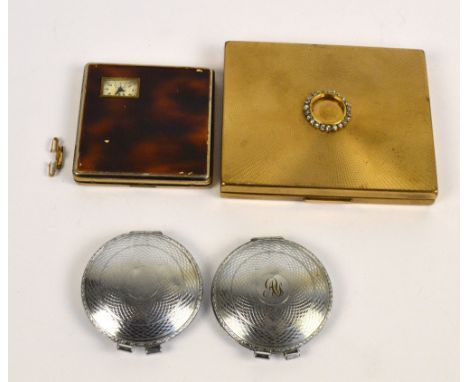 A vintage French gilt metal and faux tortoiseshell lady's powder compact with fitted Weldwood watch, a further larger example