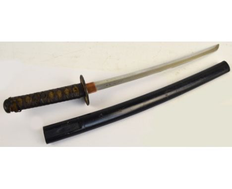 A Japanese wakizashi with shagreen bound grip, pierced petrified iron tsuba, length of blade 46cm, with scabbard.