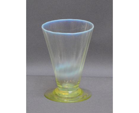 JAMES POWELL WHITEFRIARS; a straw opal beaker with slightly moulded conical bowl above green tinted plain foot, height 10.5cm