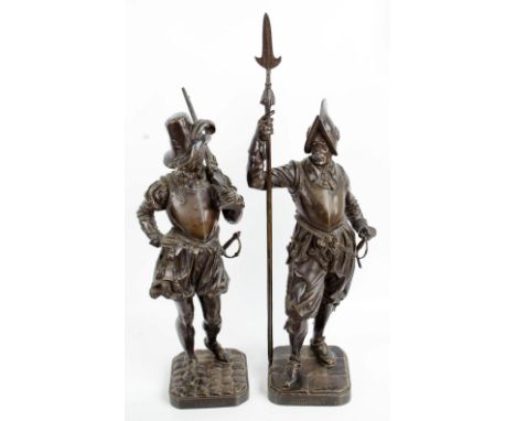AFTER A. LEVEEL; a large bronze figure  'Huguenot', height 71.5cm and a companion 'Ligueur', height 57cm (2).