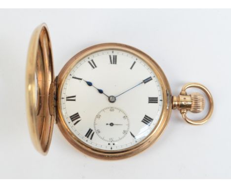 A 9ct yellow gold crown wind half hunter pocket watch with crown wind white enamel dial set with Roman numerals and subsidiar