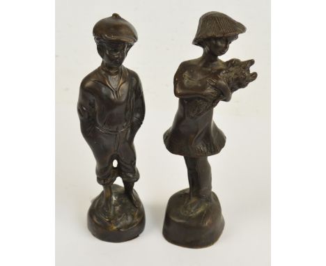 A pair of 20th century bronze figures depicting a girl holding a bunch of flowers and a boy, height 12.5cm.
