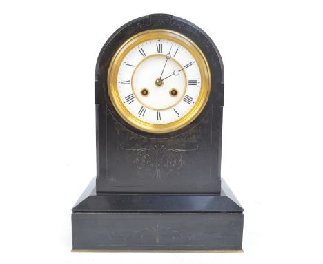 A late 19th century French black slate mantel clock, marked to movement 'J Marti Bros', height 36cm.