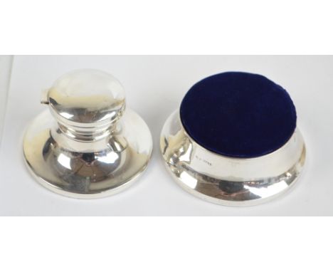 A Elizabeth II hallmarked silver capstan type inkwell with loaded circular base, Birmingham 1998, diameter 9.5cm, also a silv