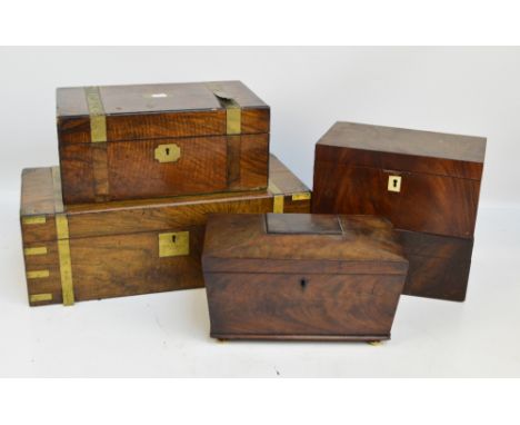 A Victorian walnut brass mounted campaign style writing slope with gilt black leather top and stationery compartment to the i