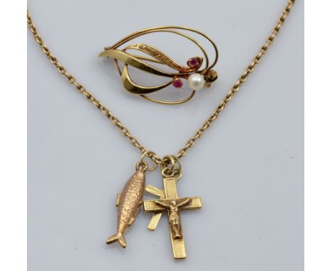 A 9ct yellow gold stylised leaf shaped brooch set with single pearl and two rubies, length 3.5cm, and a 9ct gold open link ch