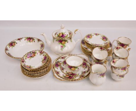 A Royal Albert 'Old Country Roses' pattern tea set, comprising a boxed teapot, tea cups with saucers, plates, dessert bowls a