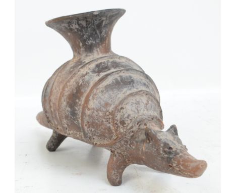 A Mayan vase modelled as an armadillo, probably 19th century, length 33cm.