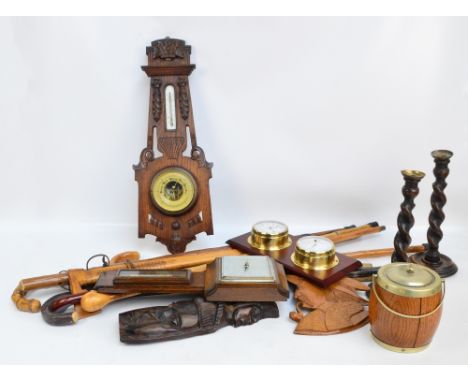 A quantity of collectors' items comprising two oak barleytwist candlesticks with glass sconces, a tobacco barrel, three vario