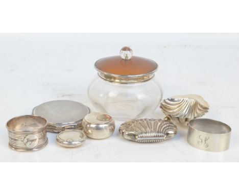 A collection of hallmarked silver items comprising an Edward VII hallmarked silver small scallop shell shaped dish with ball 