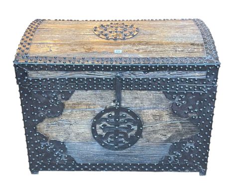 Oriental style studded and ironwork bound dome top trunk, 66cm by 89cm by 58cm.