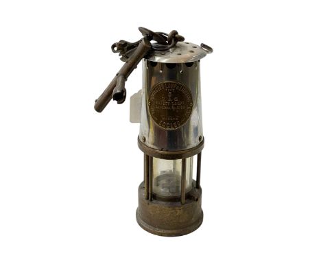 Protector miners lamp with keys and tags.