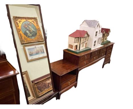 Stag Minstrel six drawer dressing table, four drawer pedestal chest, cheval mirror and lamp table (4).
