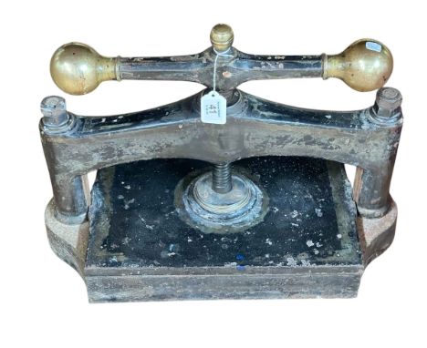 Vintage cast and brass book press.