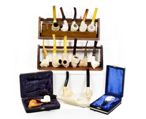 ~ Two pipe racks and a quantity of Meerschaum pipes formed as Turks etc (1 tray)