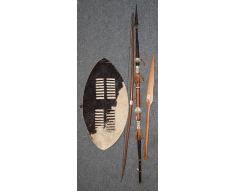 Zulu hide dance shield, two modern spears and a self bow 