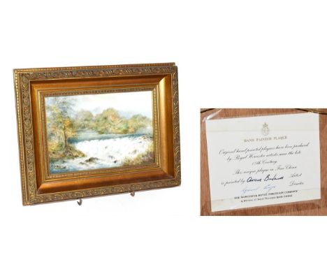 A Royal Worcester hand painted plaque decorated with a waterfall and signed A. Badman, 17cm by 11.5cm