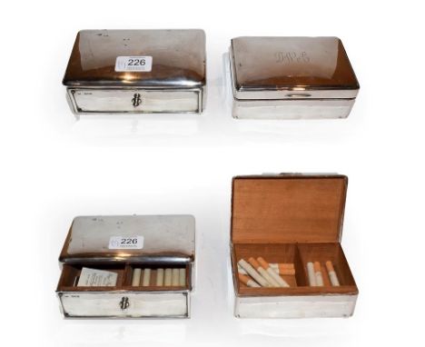 A Victorian silver cigarette-box and an Edward VIII silver cigarette-box, The First by William Comyns, London, 1898, the Seco