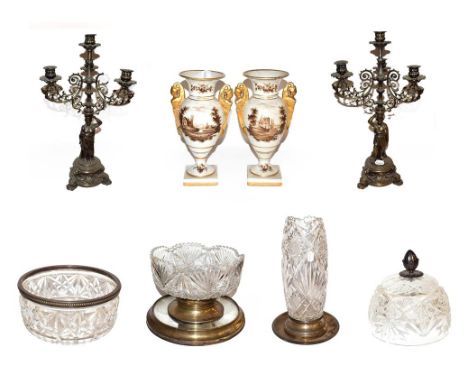 ~ A pair of Paris porcelain Empire style twin-handled vases painted with sepia monochrome landscapes, marked Nast, 23cm high;