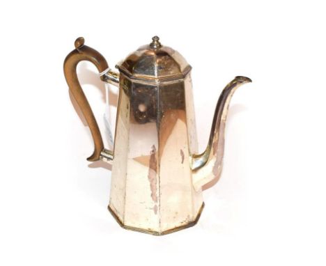 A Victorian silver coffee-pot, by George Howson, Sheffield, 1896, tapering octagonal and with carved wood handle, with domed 