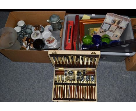 Two boxes of assorted items including reproduction pot lids, table lamp, Hornsea pottery and cased cutlery etc.