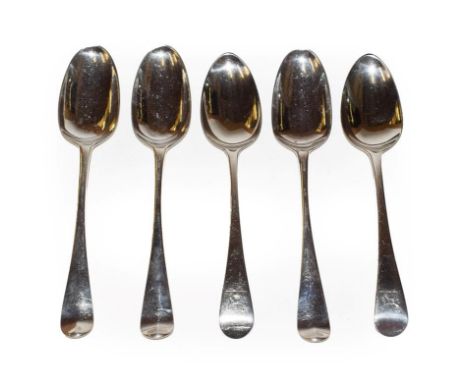 A set of three George III Irish silver table-spoons and a pair of George III silver table-spoons, the first Hanoverian patter