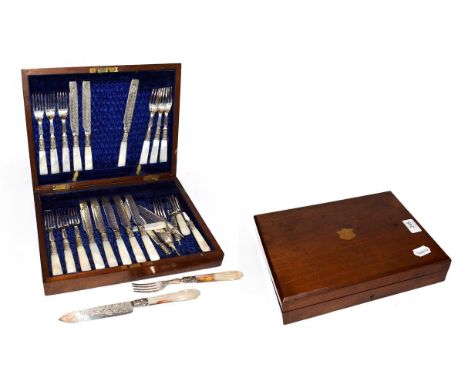 A cased set of Victorian silver plate and mother-of-pearl fruit-eaters, Circa 1880, the blades and tines engraved with foliag