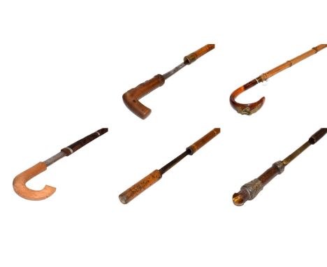 ~ Two bamboo sword sticks, two other sword sticks including one with a tigers eye pommel, together with a bamboo customs offi