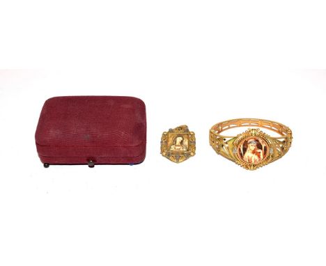 ~ An Art Nouveau style gilt hinged bangle decorated with a lady in profile with rose cut diamond detail, inner measurements 5